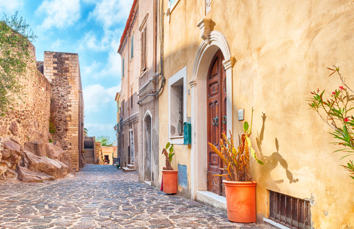 the beautiful alley of castelsardo old city - sardinia - italy