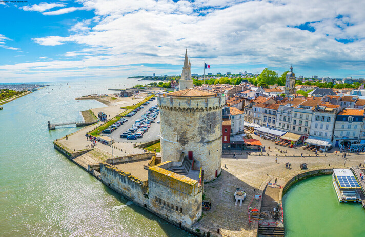 Seaside of La Rochelle dominated by Tour de la Lanterne and tour de la chaine, France