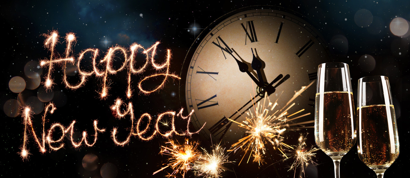 New Years Eve celebration background. Toast with fireworks and champagne at midnight